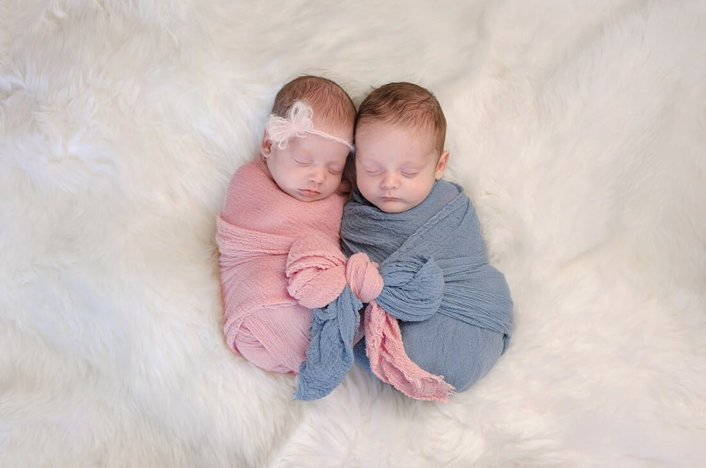 Two month old, boy and girl fraternal twin babies - Roll Up Baby